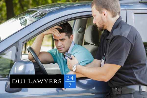 man getting pulled over and given a ticket, Illinois Traffic Violation Lawyer