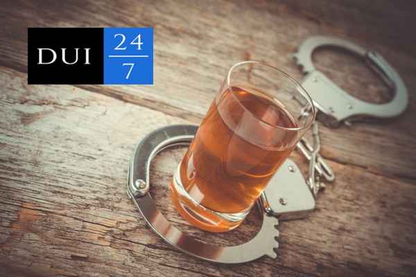 glass of beer sitting by handcuffs, Illinois Felony DUI Lawyer
